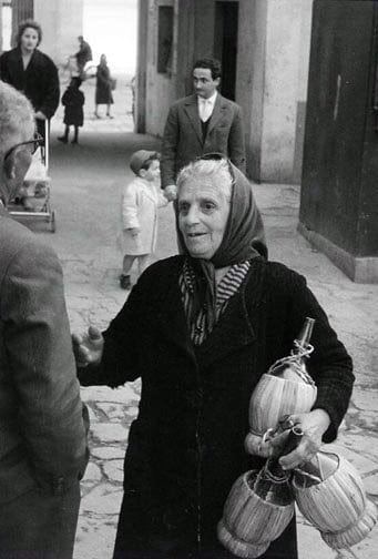Brent Hannon photo Woman with Wine Bottles Italy 1958 Art Works Gallery